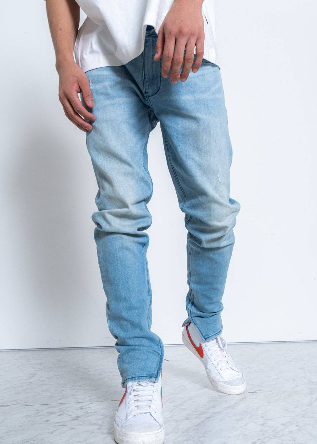 Men's Light Washed Denim With Repair Works