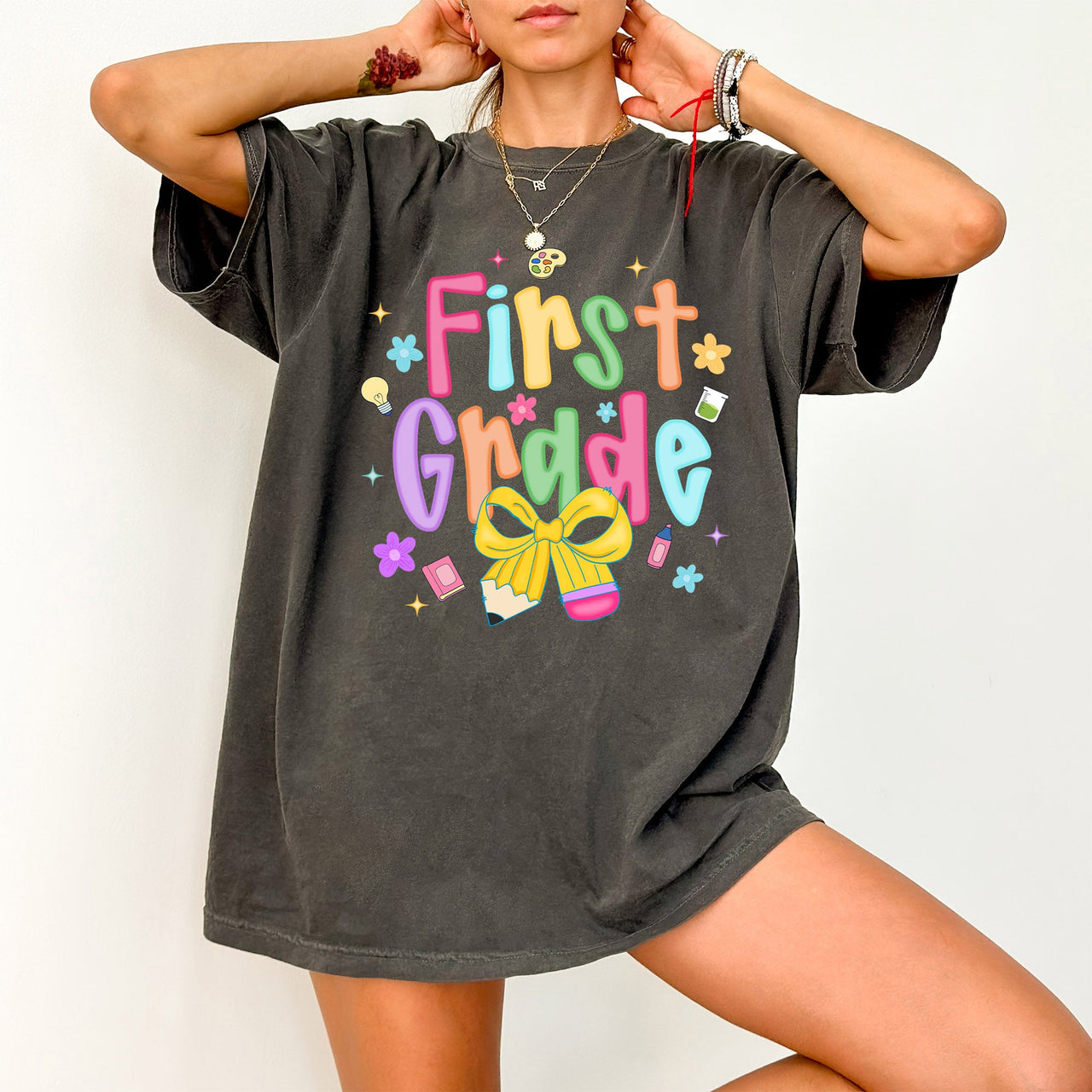 First Grade Teacher Neon Bow Graphic Back To School First Day Of School Celebration For Educators Comfort Colors Tee