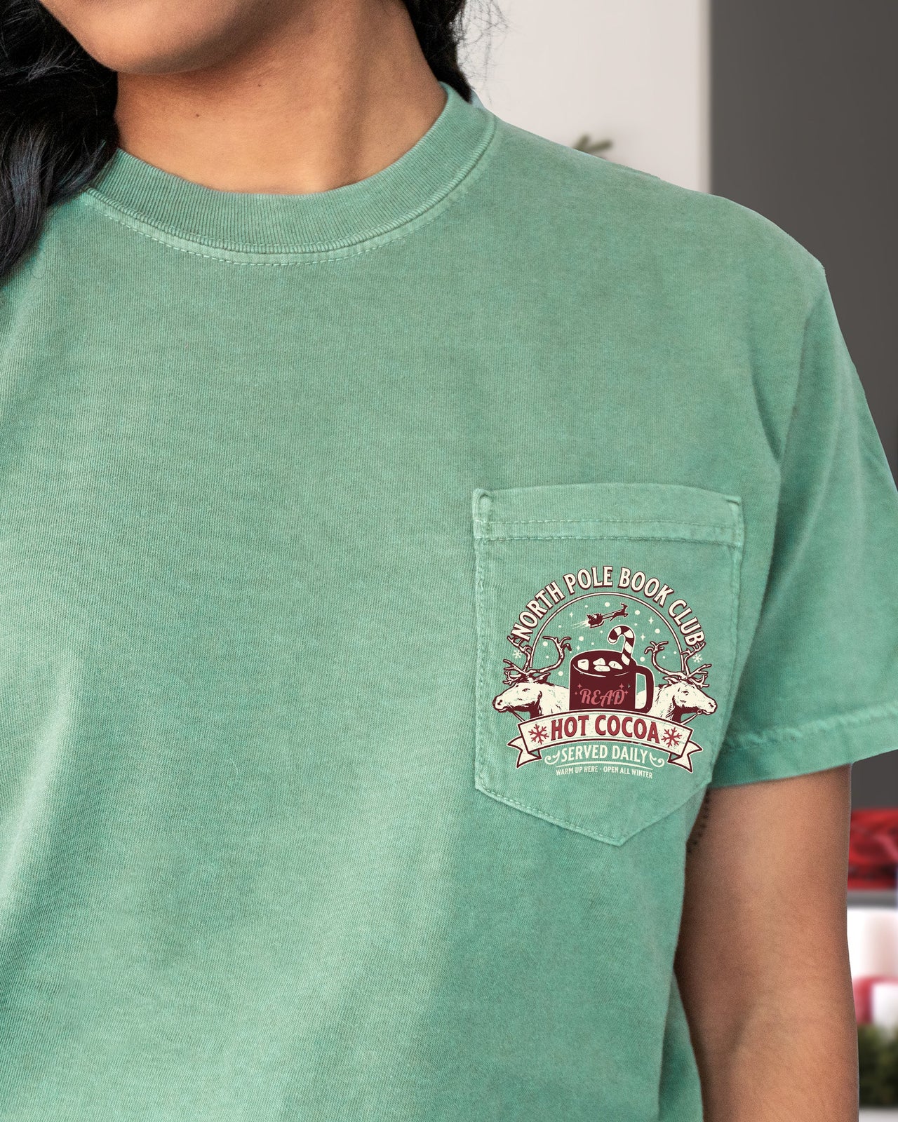 North Pole Book Club Pocket Hot Cocoa Christmas Winter Snow Reindeer Santa Xmas Comfort Colors Tee