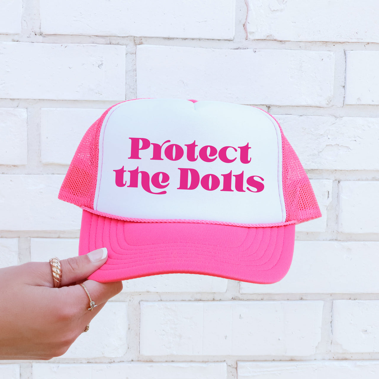 Protect The Dolls Sassy Funny Bold Statement About Confidence And Attitude Trucker Hat