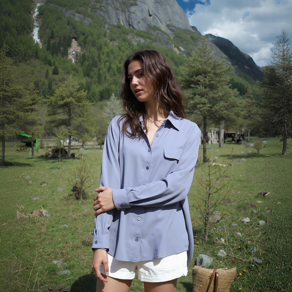 Pleione Women's Solid Low Back Button Shirt in Dusty Blue