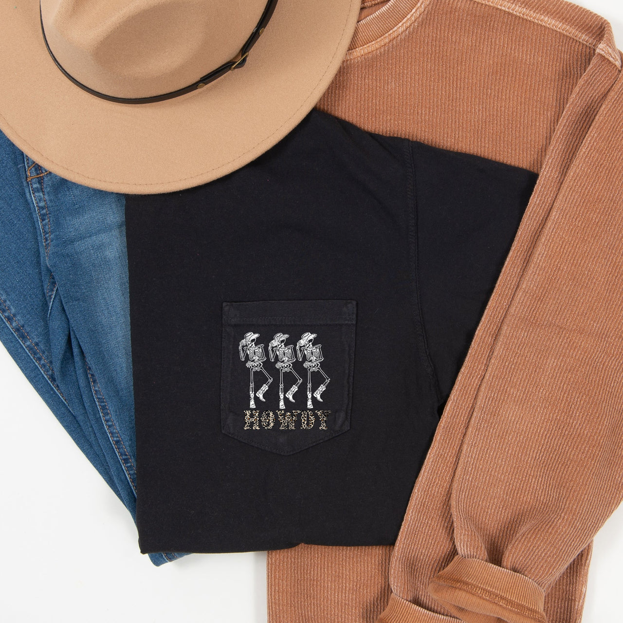 Howdy Skeletons Leopard Halloween Pocket Print With Western Style Skeletons In Leopard Spots At Dusk Comfort Colors Tee